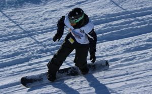An image of Matt Robinson in action while snow boarding