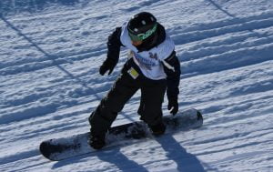 An image of Matt Robinson in action while snow boarding