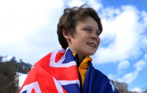An image of Ben Tudhope carrying the Australian flag