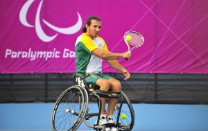 An image of Adam Kellerman in action during wheelchair tennis