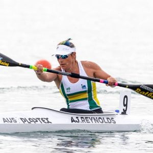Image of a female athlete in action during para-canoeing