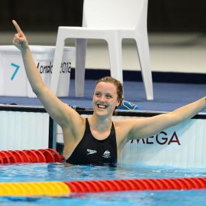 An image of Ellie Cole in the pool, smiling.