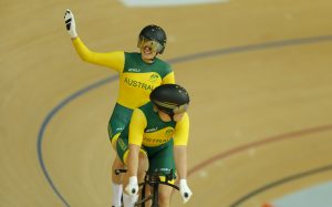 An image of Jessica Gallagher and Madison Janssen riding a cycle