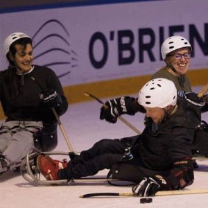 An image of players in a para-ice hockey match