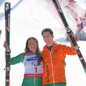 An image of Melissa Perrine and Christian Geiger smiling