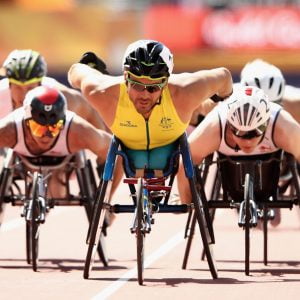 An image of Kurt Fearnley participating in athletics with other parathletes