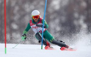 An image of Mitchell Gourley in action while skiing