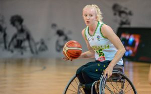 An image of a paraathlete playing wheelchair basketball