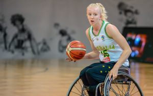 An image of a paraathlete playing wheelchair basketball