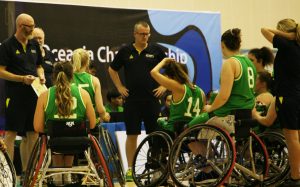Image of a para-athlete team with coaches