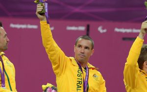 male paralympian hand in the air