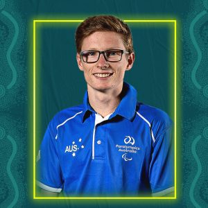 Image containing a dark green background with a yellow border. In the middle is a headshot of Australian para-athlete Jaryd Clifford looking straight at the camera. He is wearing a blue t-shirt.