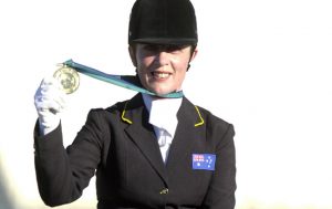 Para-equestrian rider Julie Higgins with a gold medal at the Sydney 2000 Paralympic Games
