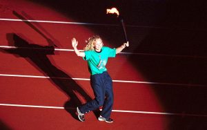 Australian Paralympian Katrina Webb carrying the Sydney 2000 Paralympic Flame