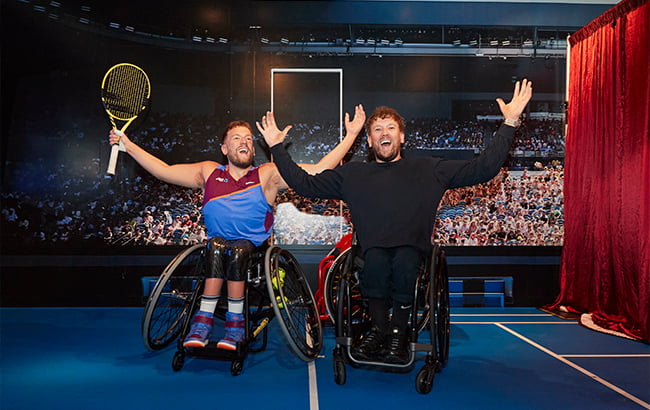 Australian Paralympian Dylan Alcott with his wax figure at Madame Tussauds.