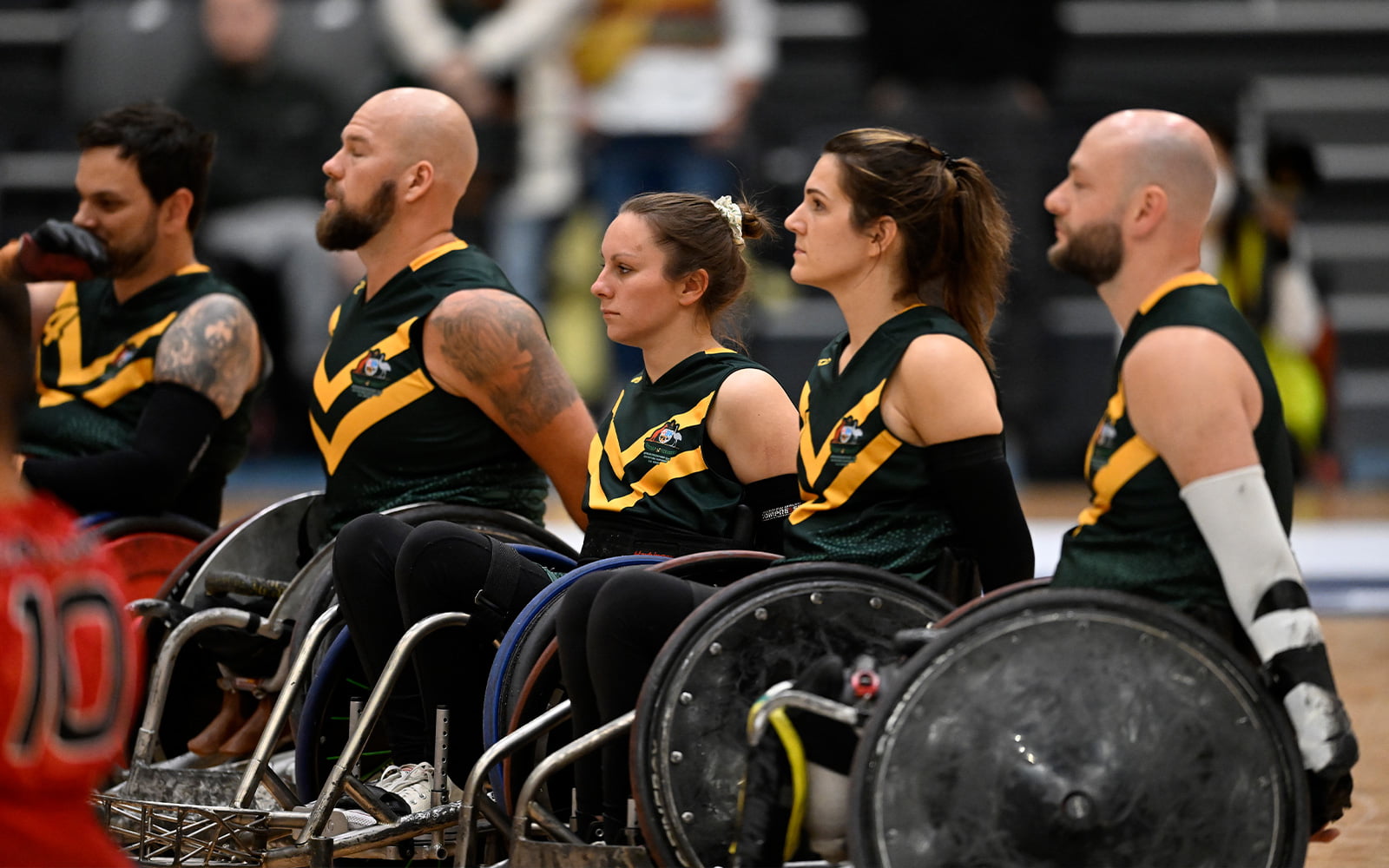 Australian Steelers Wheelchair rugby players lined up for the anthem before a match.